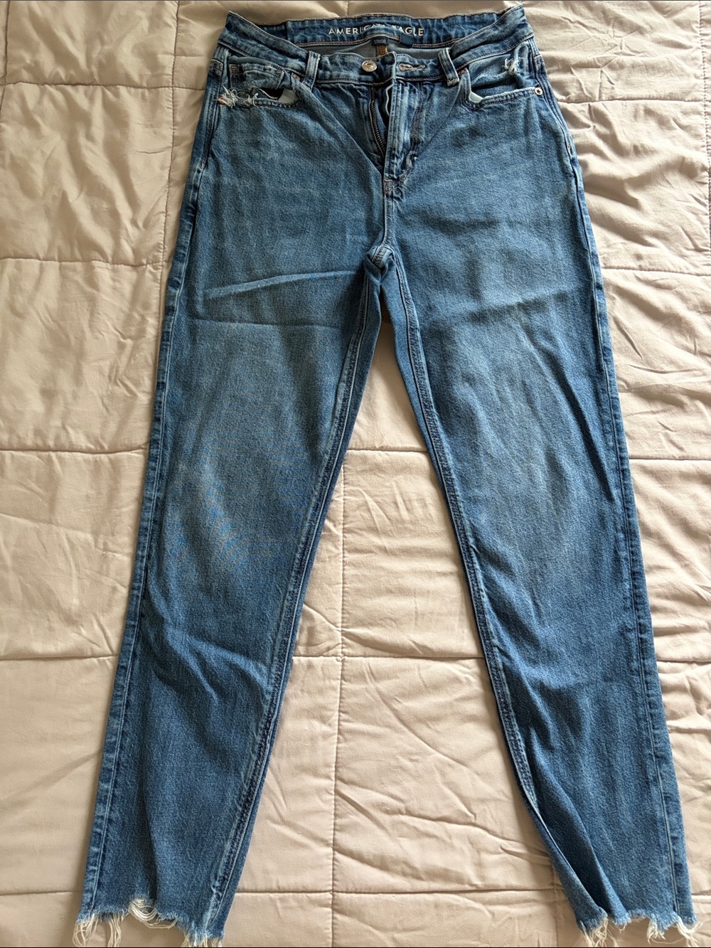 American Eagle Outfitters High-Rise Light Blue Distressed Jeans